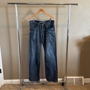 Men’s Helix Loose Straight Jeans. Size 34/34. Tear in pocket, see picture.